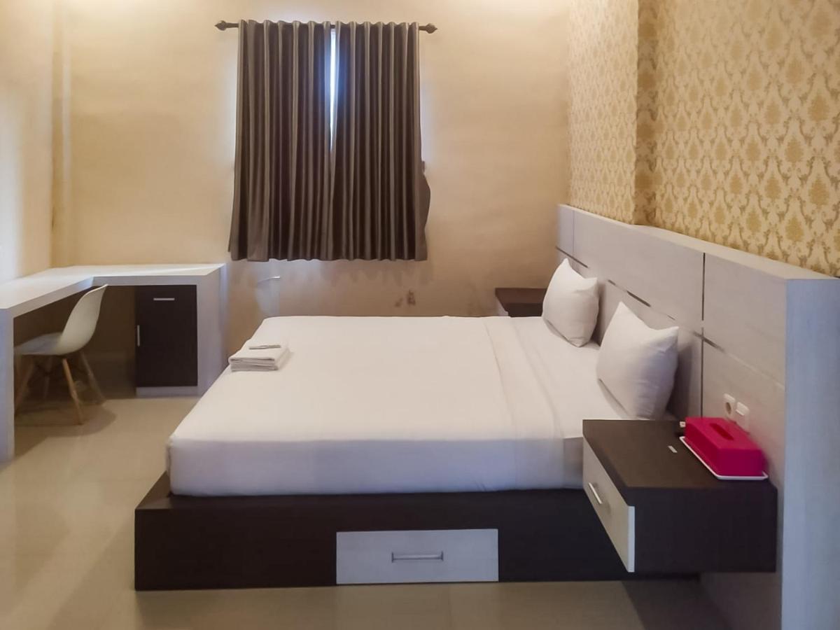 Hotel Reddoorz Syariah Near Sultan Syarif Kasim II Airport Pekanbaru Exterior foto